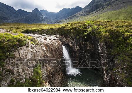 "Waterfall at the Fairy Pools in Glen Brittle with Cuillin Hills behind, Isle of Skye, Scotland, United Kingdom, Europe" View Large Photo Image Picture - "Waterfall at the Fairy Pools in Glen Brittle with Cuillin Hills behind, Isle of Skye, Scotland, United Kingdom, Europe". Fotosearch