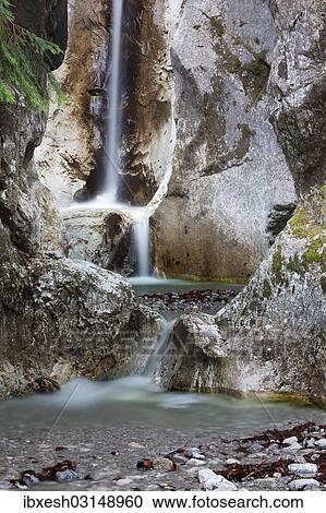 Stock Image - "Waterfall in Heckenbachklamm gorge, near Kochel, Bavaria, Germany, Europe". Fotosearch