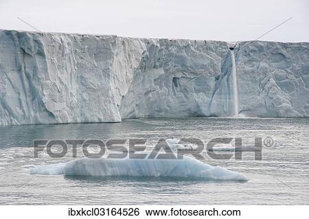 "Waterfall of meltwater at the glacier front of Brasvellbreen, the longest glacier front in the northern hemisphere, Austfonna, Nordaustlandet, Svalbard Archipelago, Svalbard and Jan Mayen, Norway, Europe" View Large Photo Image Stock Photograph - "Waterfall of meltwater at the glacier front of Brasvellbreen, the longest glacier front in the northern hemisphere, Austfonna, Nordaustlandet, Svalbard Archipelago, Svalbard and Jan Mayen, Norway, Europe". Fotosearch