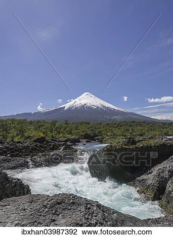 "Waterfall of the Rio Petrohue and the Osorno volcano, Parc Nacional Vicente Perez Ros, Puerto Varas, Los Lagos Region, Chile, South America" View Large Photo Image Stock Image - "Waterfall of the Rio Petrohue and the Osorno volcano, Parc Nacional Vicente Perez Ros, Puerto Varas, Los Lagos Region, Chile, South America". Fotosearch