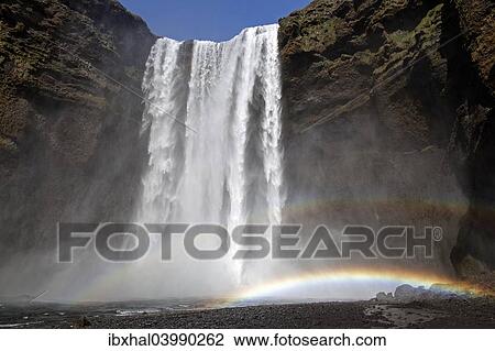 "Waterfall with a rainbow, Skogafoss, Iceland, Europe" View Large Photo Image Stock Image - "Waterfall with a rainbow, Skogafoss, Iceland, Europe". Fotosearch
