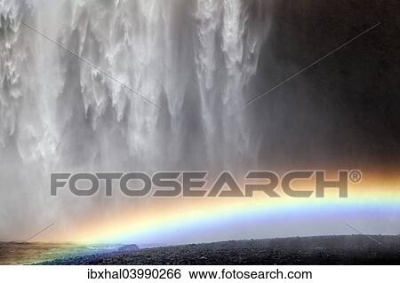 "Waterfall with a rainbow, Skogafoss, Iceland, Europe" View Large Photo Image Stock Photograph - "Waterfall with a rainbow, Skogafoss, Iceland, Europe". Fotosearch