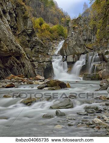 "Waterfalls of the Grand Eyvia in autumn, Gran Paradiso National Park, Valle di Cogne, Piedmont, Italy, Europe" View Large Photo Image Stock Photography - "Waterfalls of the Grand Eyvia in autumn, Gran Paradiso National Park, Valle di Cogne, Piedmont, Italy, Europe". Fotosearch