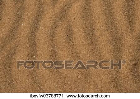 Stock Image - "Wave pattern in the sand, Sossusvlei, Namib Naukluft Park, Namibia, Africa". Fotosearch
