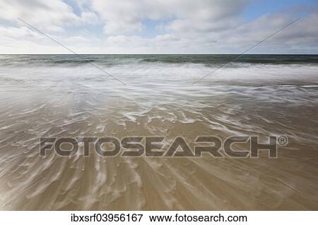 "Waves at the beach, Sylt, Schleswig-Holstein, Germany, Europe" View Large Photo Image Stock Photo - "Waves at the beach, Sylt, Schleswig-Holstein, Germany, Europe". Fotosearch