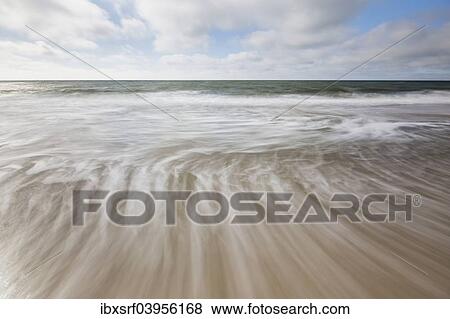 "Waves at the beach, Sylt, Schleswig-Holstein, Germany, Europe" View Large Photo Image Stock Photo - "Waves at the beach, Sylt, Schleswig-Holstein, Germany, Europe". Fotosearch