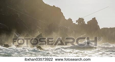 "Waves breaking against the cliffs at the Buccaneers Cove, San Salvador Island, Galapagos Islands, Ecuador, South America" View Large Photo Image Stock Image - "Waves breaking against the cliffs at the Buccaneers Cove, San Salvador Island, Galapagos Islands, Ecuador, South America". Fotosearch