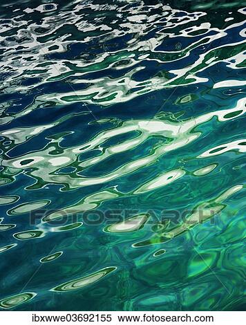 Wavy water surface area View Large Photo Image Stock Photography - Wavy water surface area. Fotosearch