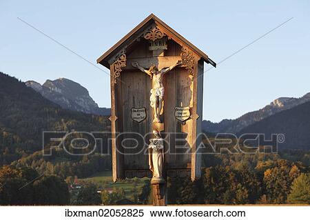 Stock Photography - "Wayside cross in Wiechs, Mt Wendelstein at back, Bad Feilnbach, Upper Bavaria, Bavaria, Germany, Europe". Fotosearch