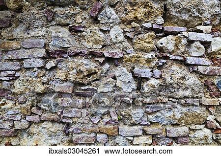 "Weathered stone wall, brick wall" View Large Photo Image Stock Image - "Weathered stone wall, brick wall". Fotosearch