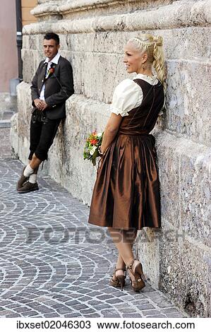 Stock Image - "Wedding, bride and groom in traditional dress". Fotosearch