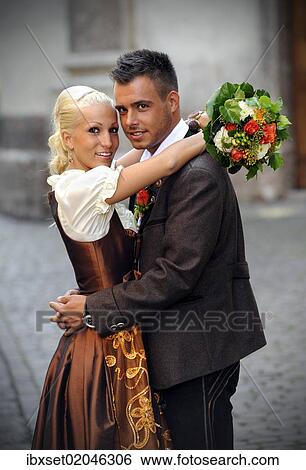 Stock Photograph - "Wedding, bride and groom in traditional dress". Fotosearch