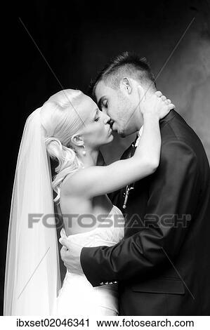 "Wedding, bride and groom kissing" View Large Photo Image Stock Image - "Wedding, bride and groom kissing". Fotosearch