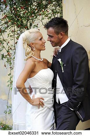 "Wedding, bride and groom looking at each other" View Large Photo Image Stock Image - "Wedding, bride and groom looking at each other". Fotosearch