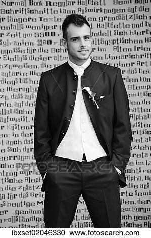 "Wedding, groom standing in front of a wall with letters" View Large Photo Image Stock Image - "Wedding, groom standing in front of a wall with letters". Fotosearch