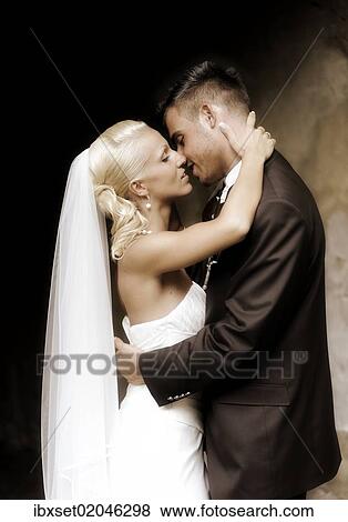 Stock Photo - "Wedding, kissing bride and groom". Fotosearch
