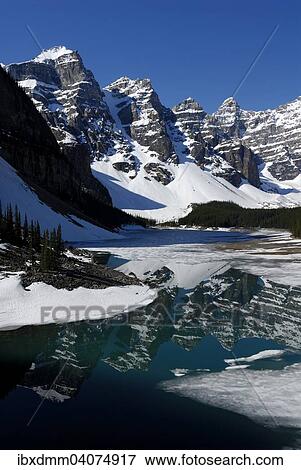 "Wenkchemna Peaks mountain group reflected in the glacial Moraine Lake, Valley Of The Ten Peaks, Banff National Park, Rocky Mountains, Alberta Province, Canada, North America" View Large Photo Image Stock Photo - "Wenkchemna Peaks mountain group reflected in the glacial Moraine Lake, Valley Of The Ten Peaks, Banff National Park, Rocky Mountains, Alberta Province, Canada, North America". Fotosearch