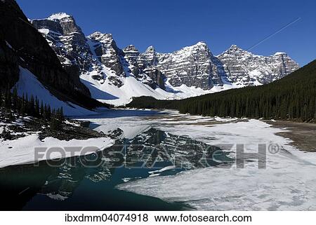 "Wenkchemna Peaks mountain group reflected in the glacial Moraine Lake, Valley Of The Ten Peaks, Banff National Park, Rocky Mountains, Alberta Province, Canada, North America" View Large Photo Image Stock Photo - "Wenkchemna Peaks mountain group reflected in the glacial Moraine Lake, Valley Of The Ten Peaks, Banff National Park, Rocky Mountains, Alberta Province, Canada, North America". Fotosearch