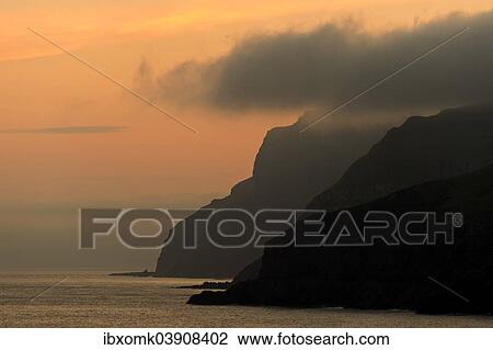 Stock Image - "West coast in the evening light, Suouroy, Faroe Islands, Denmark, Europe". Fotosearch