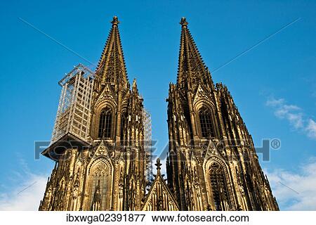 "West facade, twin-towered front of Cologne Cathedral with suspended scaffolding for renovations, Cologne, North Rhine-Westphalia, Germany, Europe, PublicGround, Europe" View Large Photo Image Stock Photo - "West facade, twin-towered front of Cologne Cathedral with suspended scaffolding for renovations, Cologne, North Rhine-Westphalia, Germany, Europe, PublicGround, Europe". Fotosearch