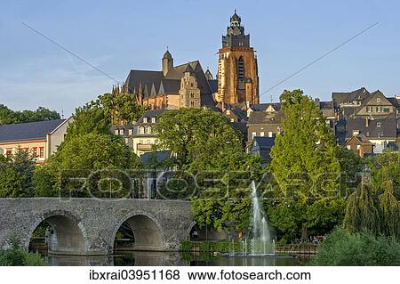 "Wetzlar Cathedral, Old Lahn Bridge, fountains of the water organ, Lahn river, old town, Wetzlar, Hesse, Germany, Europe" View Large Photo Image Stock Photo - "Wetzlar Cathedral, Old Lahn Bridge, fountains of the water organ, Lahn river, old town, Wetzlar, Hesse, Germany, Europe". Fotosearch