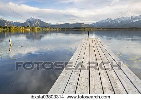 "Wharf on Hopfensee lake, near Fussen, East Allgau, Bavaria, Germany, Europe" View Large Photo Image Picture - "Wharf on Hopfensee lake, near Fussen, East Allgau, Bavaria, Germany, Europe". Fotosearch