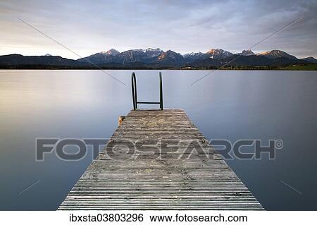 Stock Photograph - "Wharf on Hopfensee lake, near Fussen, East Allgau, Bavaria, Germany, Europe". Fotosearch