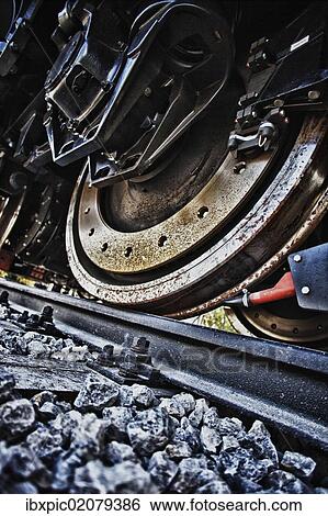Wheels of a freight train View Large Photo Image Stock Photograph - Wheels of a freight train. Fotosearch