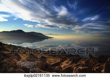 "White clouds drift over Antelope Island in the Great Salt Lake, Utah, USA" View Large Photo Image Stock Photography - "White clouds drift over Antelope Island in the Great Salt Lake, Utah, USA". Fotosearch