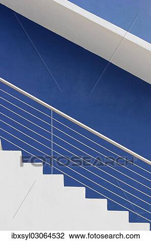 White steps in front of a blue wall View Large Photo Image Stock Image - White steps in front of a blue wall. Fotosearch