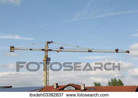 "White storks (Ciconia ciconia) and ten white stork nests on a construction crane, Kirchheim, Unterallgau District, Bavaria, Germany, Europe" View Large Photo Image Stock Photo - "White storks (Ciconia ciconia) and ten white stork nests on a construction crane, Kirchheim, Unterallgau District, Bavaria, Germany, Europe". Fotosearch