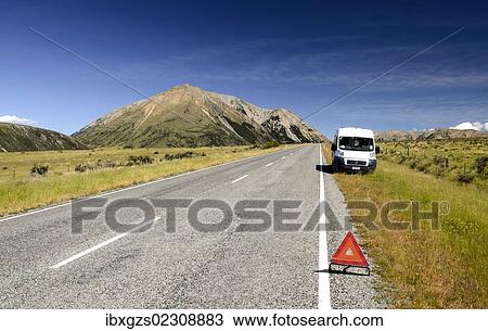 "White van parked on the roadside, breakdown triangle, breakdown, Craigieburn Range, Canterbury, South Island, New Zealand, Oceania" View Large Photo Image Stock Image - "White van parked on the roadside, breakdown triangle, breakdown, Craigieburn Range, Canterbury, South Island, New Zealand, Oceania". Fotosearch