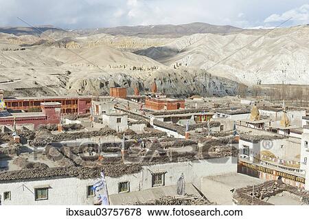 Stock Photo - "Wide landscape with hills, view over the walled city north to Tibet, Lo Manthang, Upper Mustang, Nepal, Asia". Fotosearch