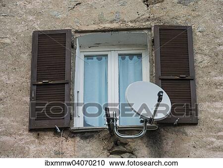 "Window in a dilapidated building with satellite dish and open shutters, Corte, Corsica, France, Europe" View Large Photo Image Stock Image - "Window in a dilapidated building with satellite dish and open shutters, Corte, Corsica, France, Europe". Fotosearch