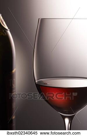 Stock Photography - Wine glass with a bottle. Fotosearch