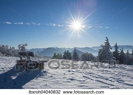"Winter bench in front of Alps on a sunny day, Gaisberg, Salzburg, Austria, Europe" View Large Photo Image Stock Image - "Winter bench in front of Alps on a sunny day, Gaisberg, Salzburg, Austria, Europe". Fotosearch