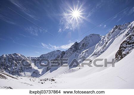 "Winter landscape with sun toward the Steintalspitze summit, Stubai Alps, Tyrol, Austria, Europe" View Large Photo Image Picture - "Winter landscape with sun toward the Steintalspitze summit, Stubai Alps, Tyrol, Austria, Europe". Fotosearch