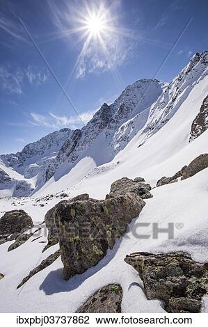 "Winter landscape with sun toward the Steintalspitze summit, Stubai Alps, Kuhtai, Tyrol, Austria, Europe" View Large Photo Image Stock Image - "Winter landscape with sun toward the Steintalspitze summit, Stubai Alps, Kuhtai, Tyrol, Austria, Europe". Fotosearch