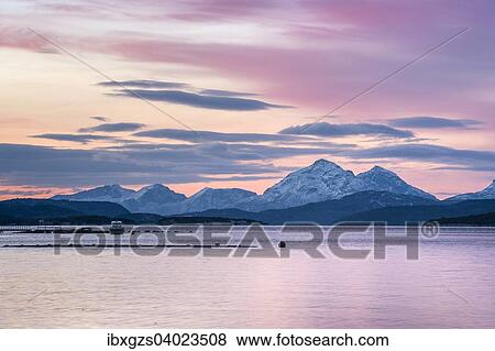 Stock Photo - "Wintry fjord at dusk, Presteidfjord, Vestfjord, Norway, Europe". Fotosearch