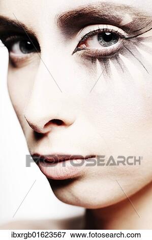 Stock Photo - "Woman, 24, with striking eye makeup". Fotosearch
