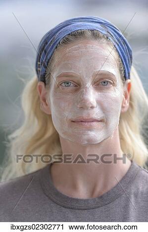 "Woman, 42, wearing a facial mask" View Large Photo Image Stock Image - "Woman, 42, wearing a facial mask". Fotosearch