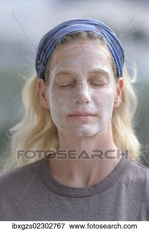 "Woman, 42, wearing a facial mask" View Large Photo Image Stock Photo - "Woman, 42, wearing a facial mask". Fotosearch
