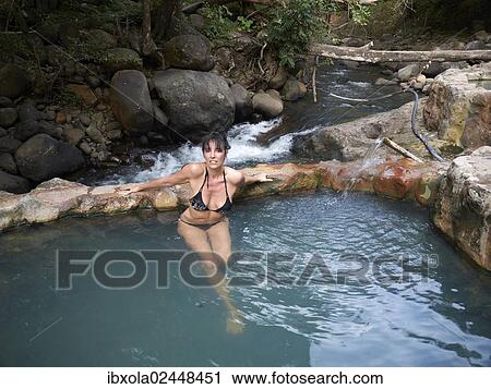 "Woman, 45, relaxing in the outdoor pool in 39 degree hot thermal water, Las Pailas, Ricon de la Vieja National Park, Province of Guanacaste, Costa Rica, Central America, North America" View Large Photo Image Stock Image - "Woman, 45, relaxing in the outdoor pool in 39 degree hot thermal water, Las Pailas, Ricon de la Vieja National Park, Province of Guanacaste, Costa Rica, Central America, North America". Fotosearch