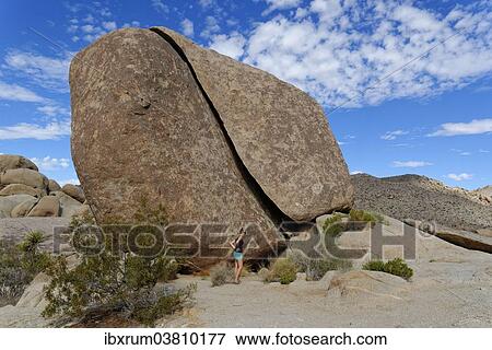 "Woman at Split Rock, Joshua Tree National Park, Desert Center, California, USA" View Large Photo Image Stock Photo - "Woman at Split Rock, Joshua Tree National Park, Desert Center, California, USA". Fotosearch