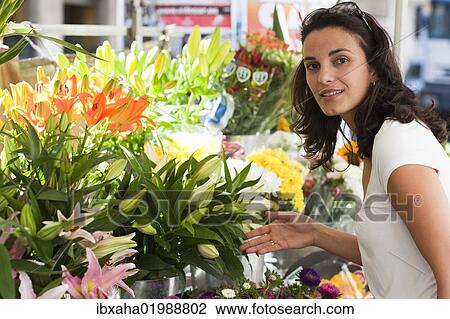 "Woman buying flowers in Las Ramblas, Barcelona, Spain, Europe" View Large Photo Image Stock Image - "Woman buying flowers in Las Ramblas, Barcelona, Spain, Europe". Fotosearch