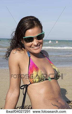"Woman in sunglasses and bikini on beach, Adriatic, Senigallia, Province of Ancona, Marche, Italy, Europe" View Large Photo Image Stock Image - "Woman in sunglasses and bikini on beach, Adriatic, Senigallia, Province of Ancona, Marche, Italy, Europe". Fotosearch