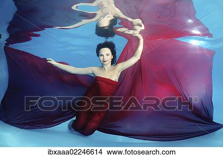 "Woman presenting underwater fashion in pool, Odessa, Ukraine, Eastern Europe, Europe" View Large Photo Image Picture - "Woman presenting underwater fashion in pool, Odessa, Ukraine, Eastern Europe, Europe". Fotosearch