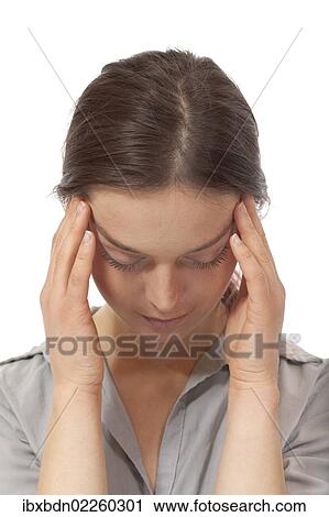 Woman rubbing her temples View Large Photo Image Stock Image - Woman rubbing her temples. Fotosearch
