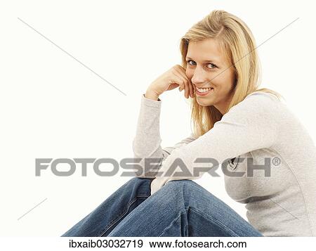 "Woman, sitting, smiling" View Large Photo Image Stock Photo - "Woman, sitting, smiling". Fotosearch