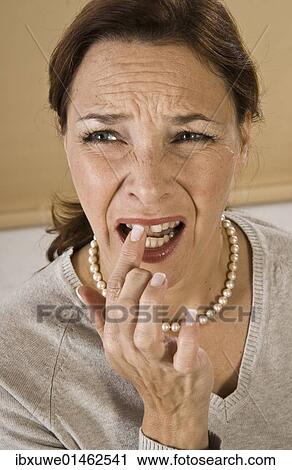 Woman with a severe toothache View Large Photo Image Stock Image - Woman with a severe toothache. Fotosearch